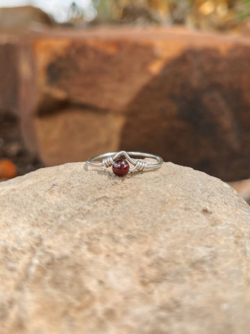 Sterling silver chevron band with Garnet stone